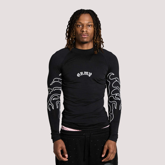 Camiseta de manga larga negra Grimey Chief Watcher Tight, ajustada y de estilo moderno, mostrada en la imagen.