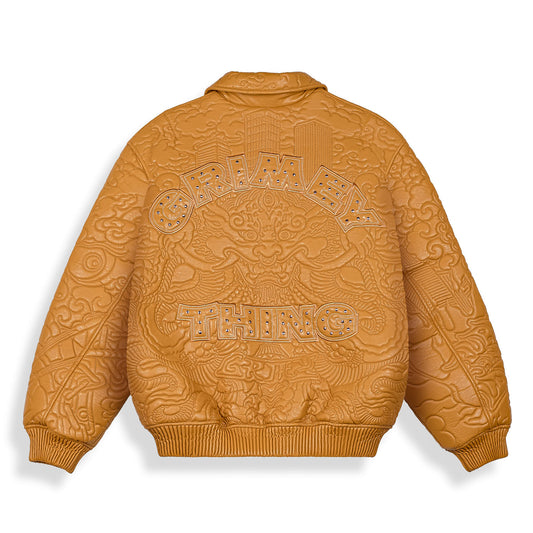 Chaqueta de cuero sintético marrón de la marca Grimey, estilo tipo blazer con cuello y cierre frontal en la imagen.