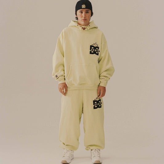 Pantalón gris de mezclilla de la marca Grimey, estilo The Swarm de DC Shoes x Grimey, con detalles en verde limón.