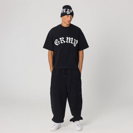 Pantalón baggy negro Rise Above de la marca Grimey, estilo oversize y cómodo, para moda urbana y casual.