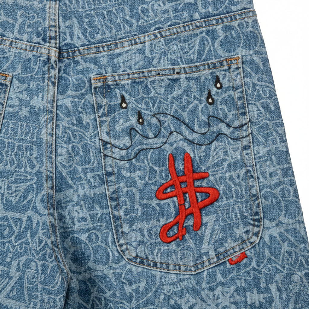 Pantalón corto vaquero azul oscuro con lavado y efecto láser, estilo baggy de la marca Grimey, estilo casual y moderno