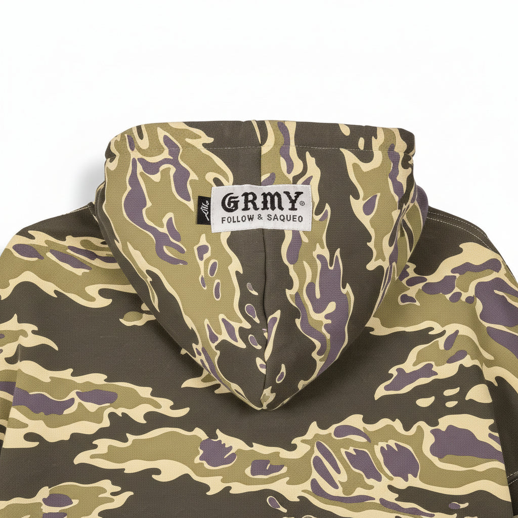 Sudadera Grimey Odd Cutlass Camo en negro con estampado camo, con capucha y corte regular, para un estilo urbano y casual.