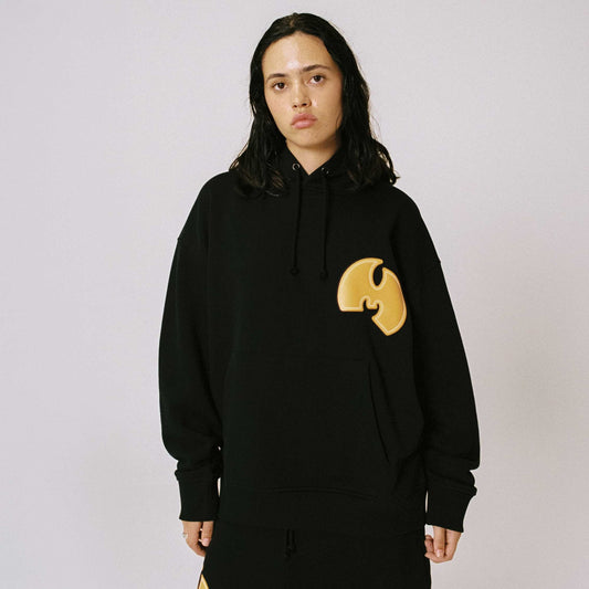Sudadera Tical X Grimey Regular en color negro con detalles en amarillo, vista frontal.