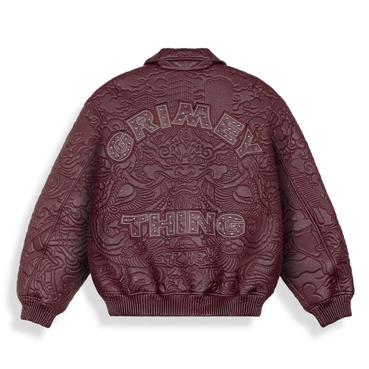 Chaqueta de cuero sintético púrpura Hans Island de Grimey, con diseño moderno y detalles en la superficie.