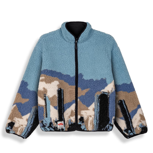 Chaqueta reversible The Props Sherpa de Grimey en color negro, con textura de forro sherpa y estilo moderno.