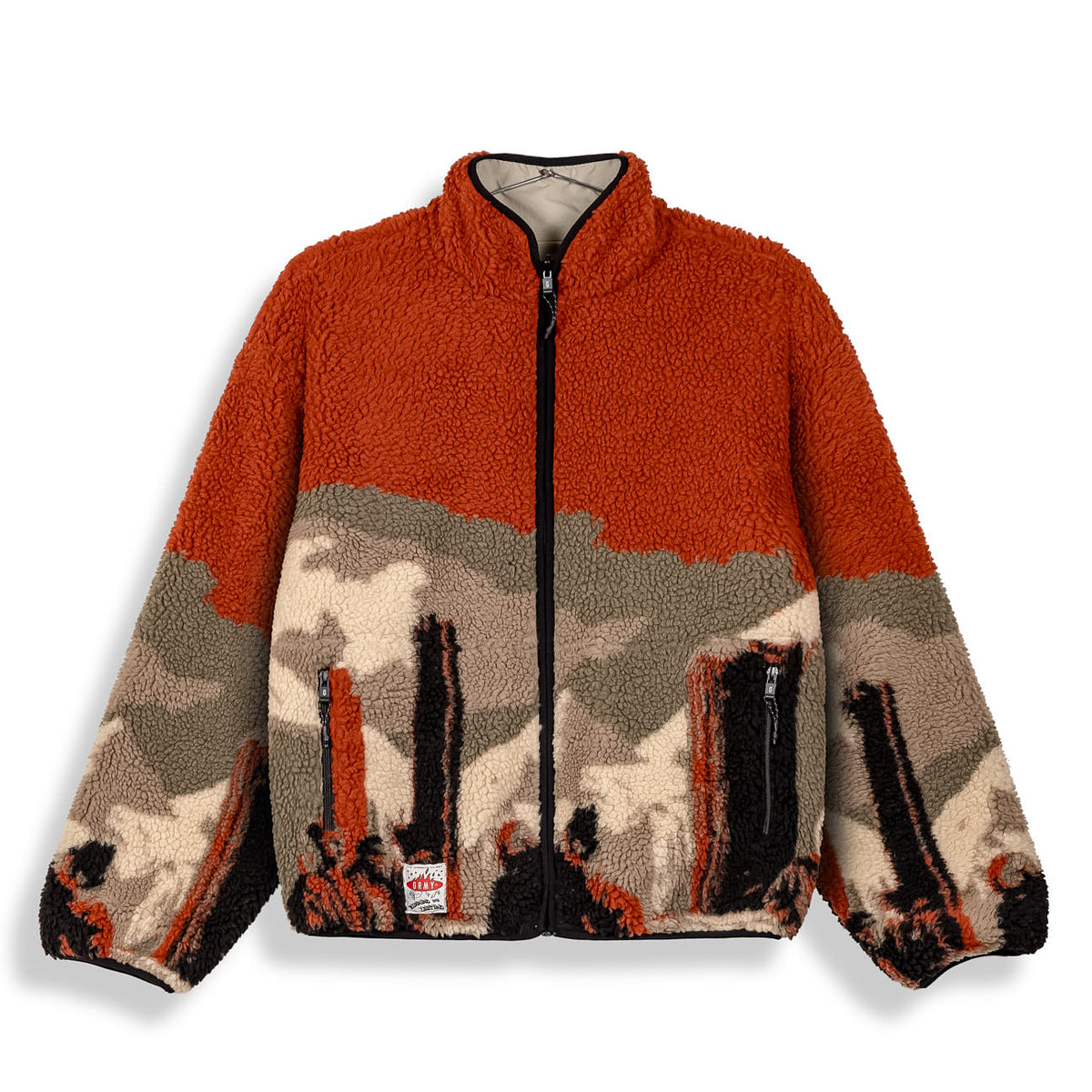 Chaqueta reversible The Props Grimey de sherpa en color kaki, vista frontal con textura suave y detalles en ambos lados.