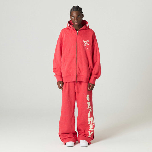Sudadera Grimey Odd Cutlass Zipper en rojo con capucha y cierre, vista frontal con detalles de diseño y bolsillos.