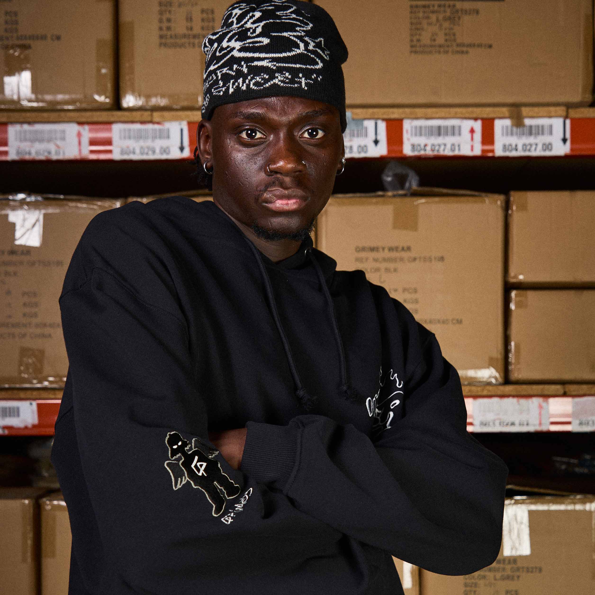 The Shelter Throw Up 2000S Black Beanie – Grimey