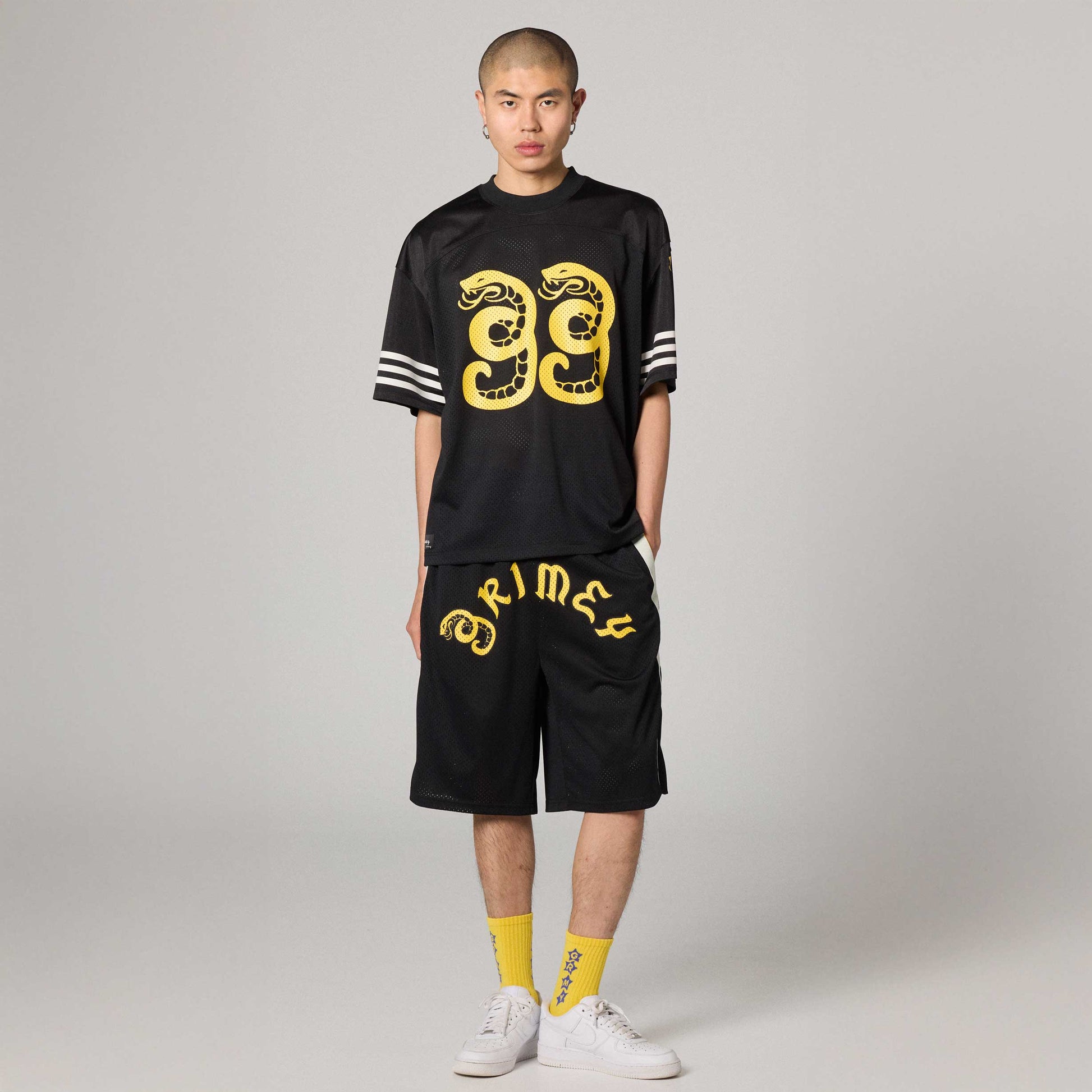 Pantalón corto baggy negro de Droppin Science de la marca Grimey, con estilo urbano y ajuste cómodo.