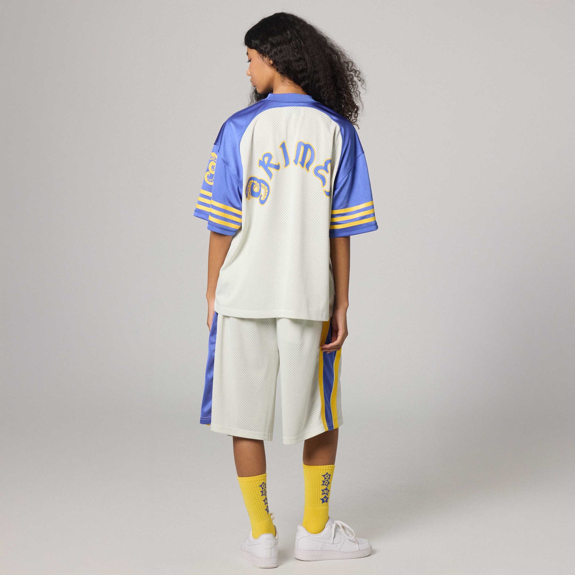 Pantalón corto baggy Droppin Science Off White de la marca Grimey, con diseño holgado y detalles en color blanco.