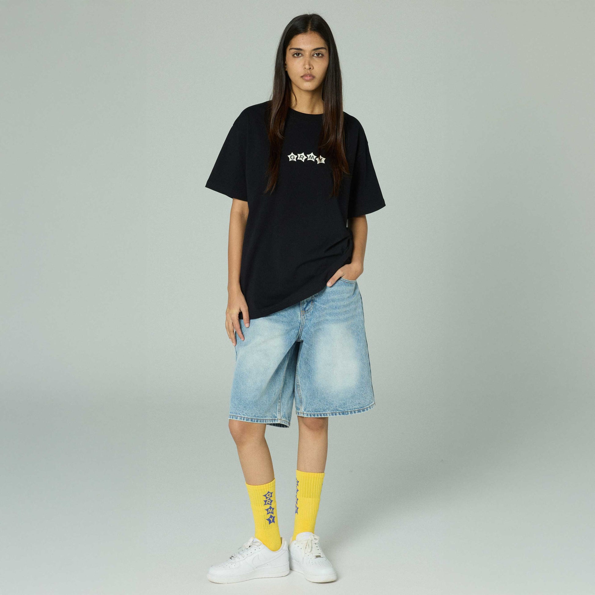 Pantalón corto baggy de mezclilla azul claro Stardust Wash de la marca Grimey, con estilo relajado y lavado desgastado.