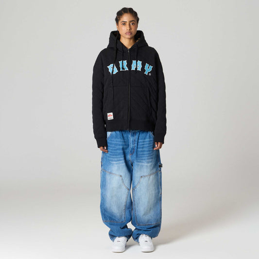 Pantalón Grimey The Props Carpenter en mezclilla azul lavado, con bolsillos y diseño resistente para trabajo y estilo casual.