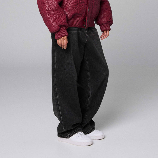 Pantalones de mezclilla gris oscuro para niño grande, estilo washed black, marca Grimey, con diseño clásico y ajustado.