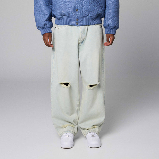 Pantalones de mezclilla azul claro para niño grande de la marca Grimey, estilo washed, con diseño clásico de denim royal paw.