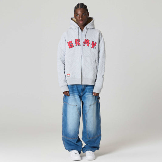 Sudadera gris con cierre en la parte delantera, acolchada y deportiva de la marca Grimey, estilo casual y cómodo.
