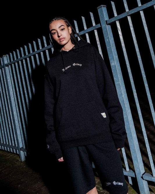 Sudadera vintage negra de Grimey "Causing Panic The Pride", con diseño gráfico en la parte frontal.